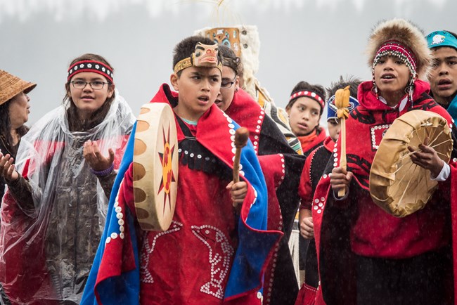 Tlingit youth Tlingit youth in song wearing regalia.