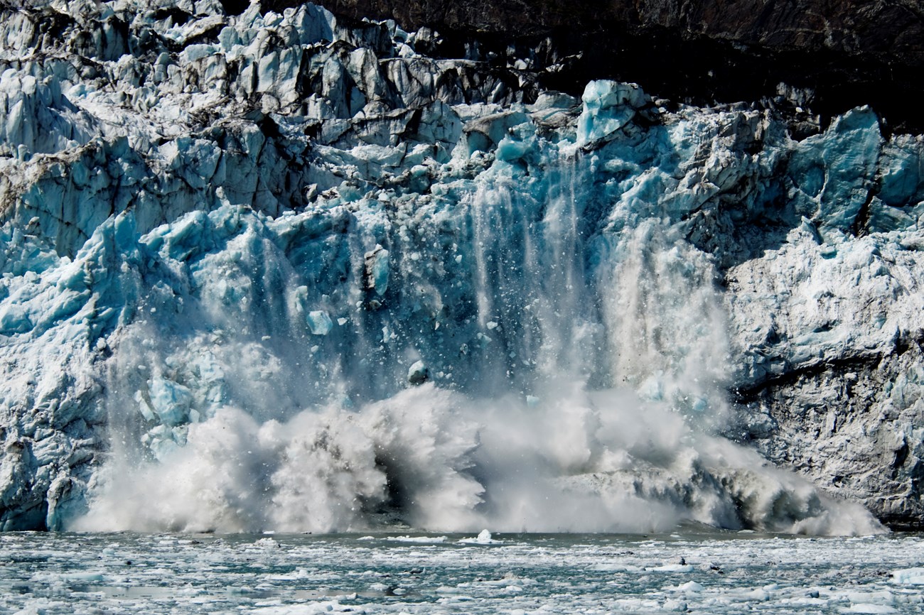 Ice falling from the face of Margerie Glacier