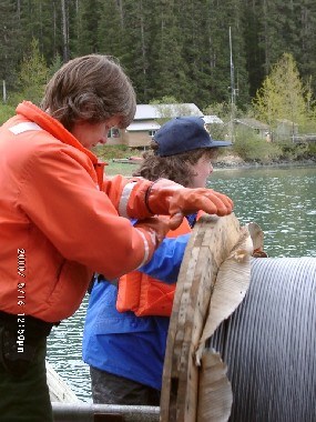 Rangers unrolling hydrophone cable