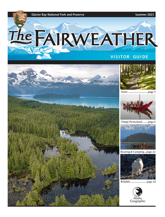2023 Fairweather Glacier Bay Visitor Guide FRONT COVER shows an image of a forest with turquoise bay and mountains behind it.