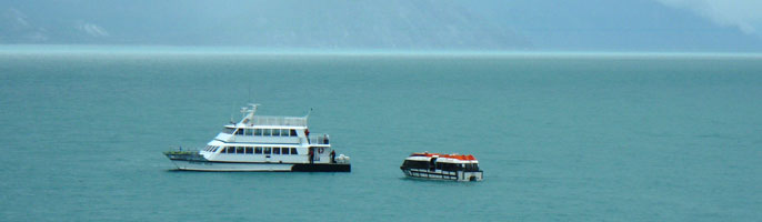 Tender from the Noordam approaches the Baranof Wind to offload passengers.