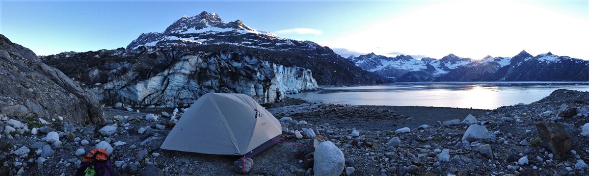 Glacier Campsite a tent near a tidewater glacier and mountains