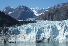 lt= The Margerie Glacier flows down twenty-one miles from its source.