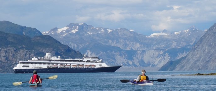 ship and kayakers