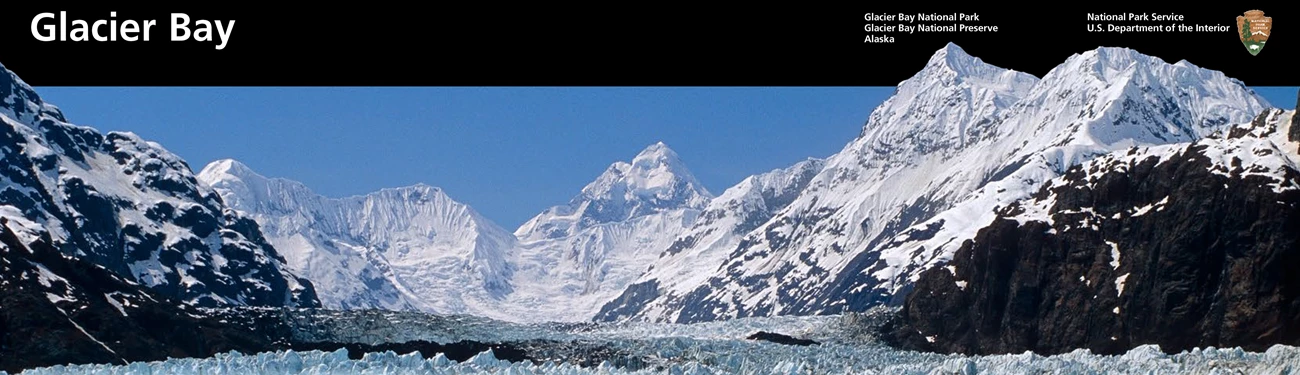 Glacier Bay Park Brochure Snippet A glacier leads high into steep rocky snow-topped mountains. Graphic layout for Glacier bay at top