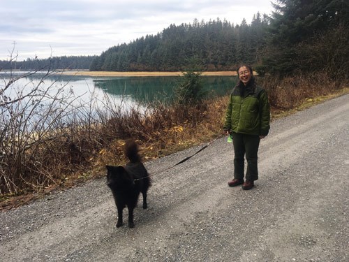 walking a dog in Bartlett Cove Visitor with dog in Bartlett Cove