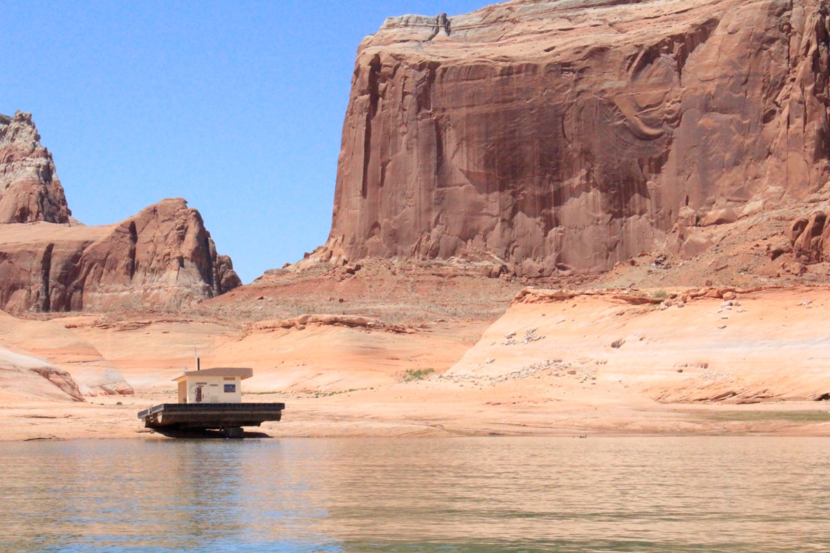 floating toilet now beached as lake levels drop