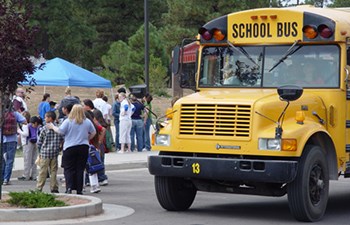 Kids unloading off school bus