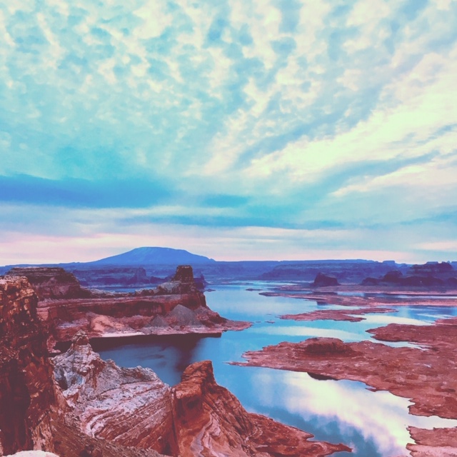 Sandstone cliffs and blue water