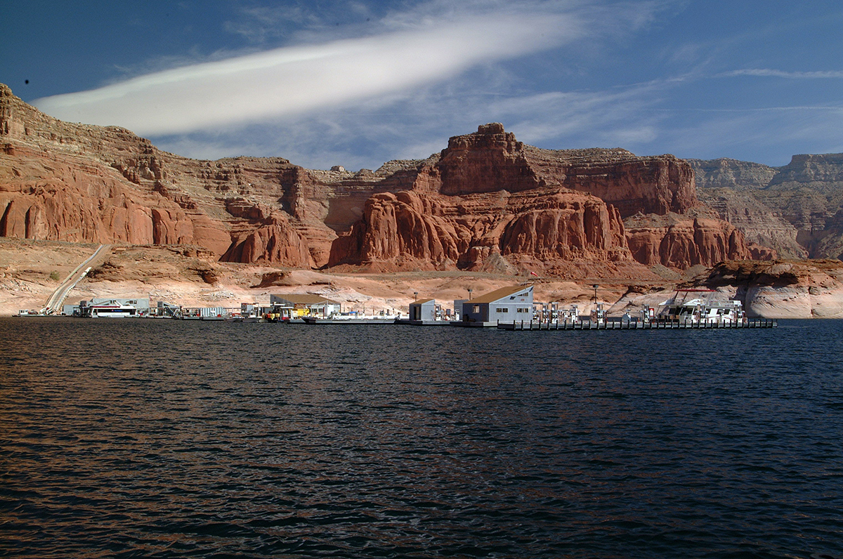 Lake marina tucked under sandstone cliffs