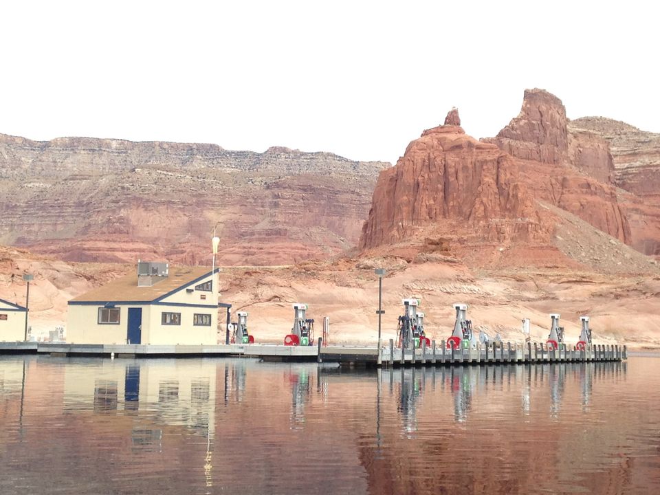 Dangling Rope Marina. NPS Photo Fuel pumps on a dock on a lake.