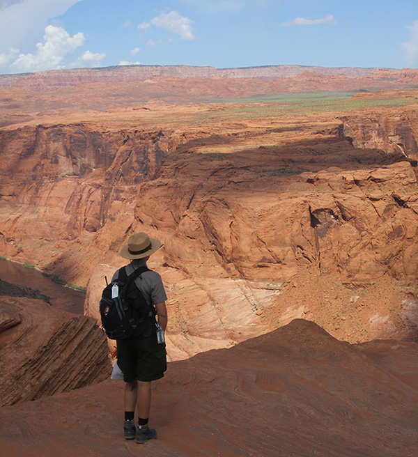 Park ranger looks out over the landscape.