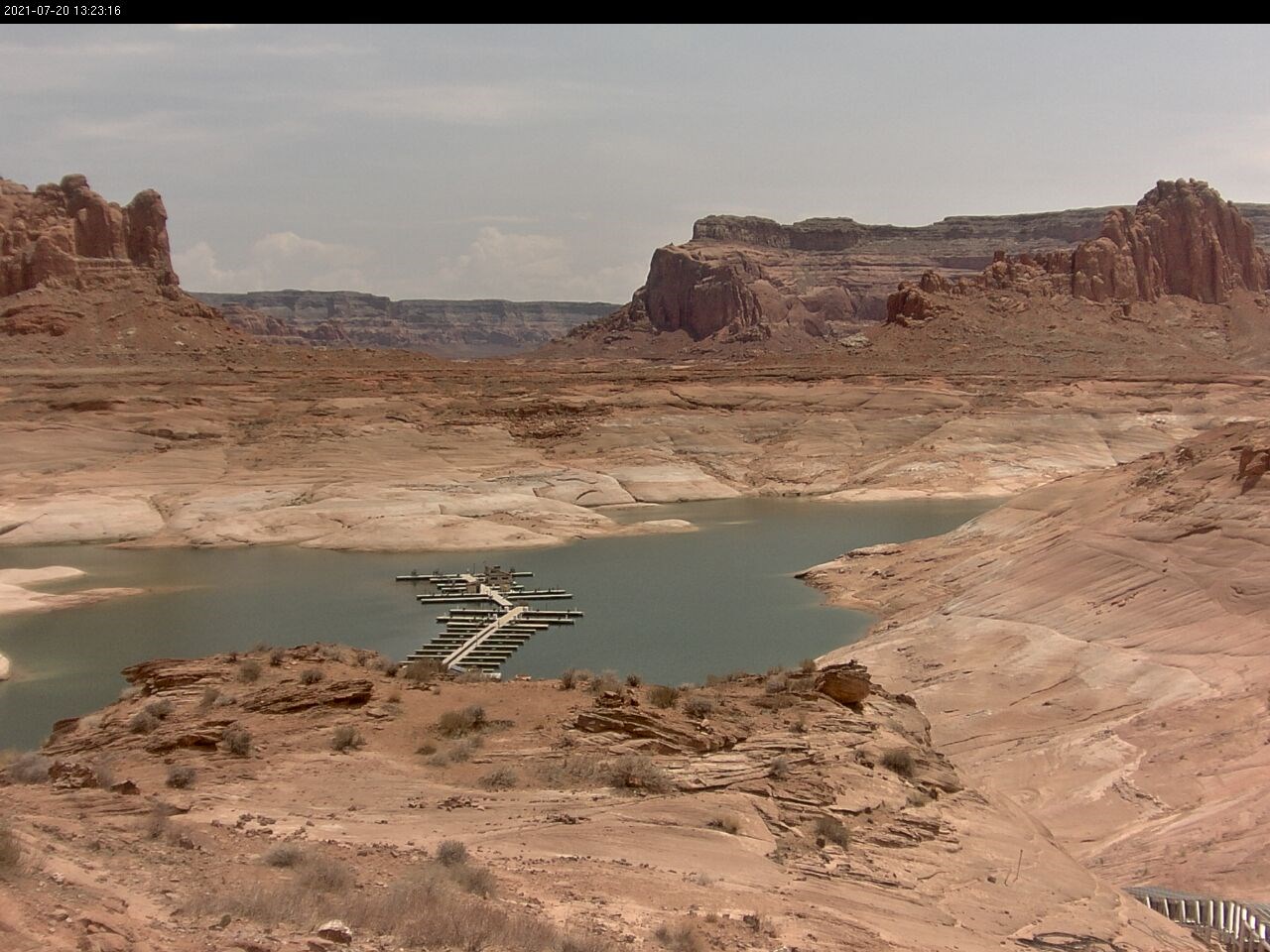 Distant view of floating marina doc on Lake Powell at Dangling Rope.