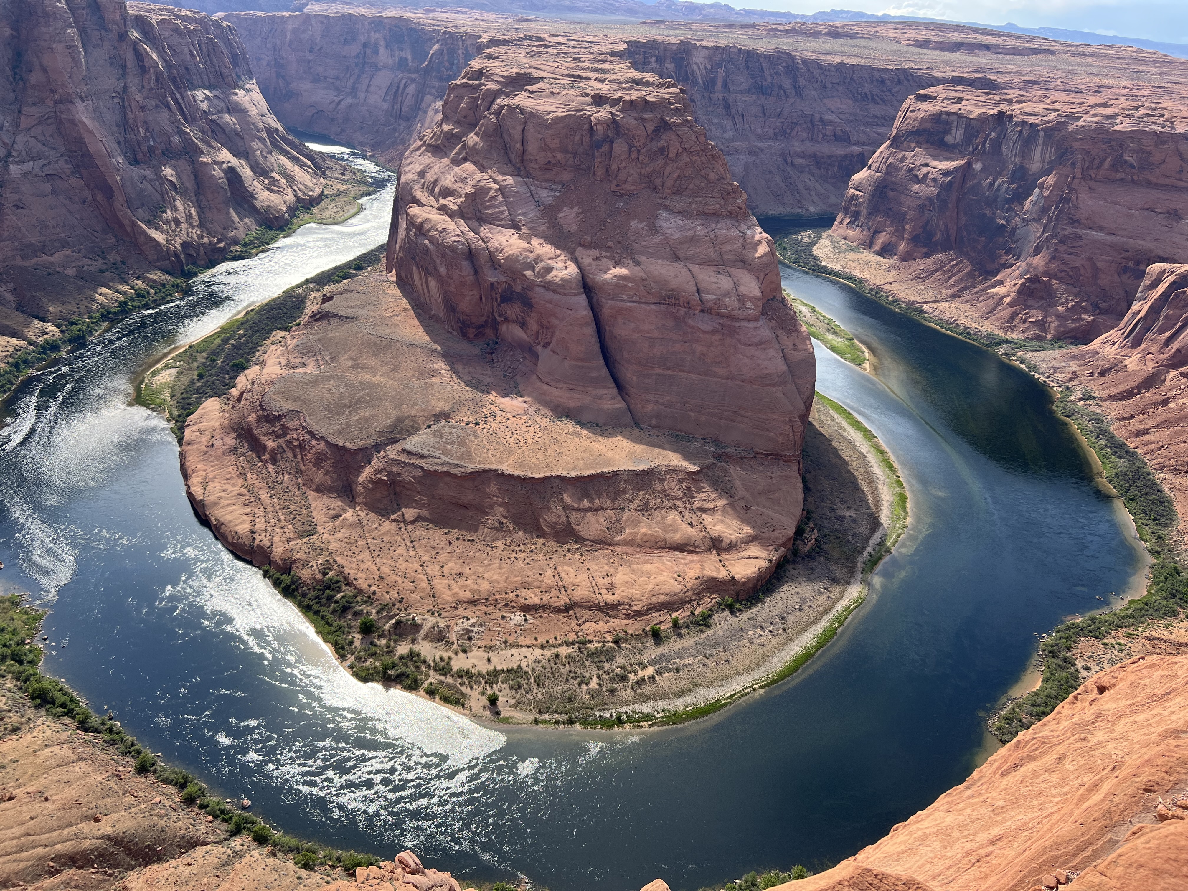 Horseshoe Bend on the Colorado River A clear river makes a perfectly round curve in the sandstone canyon.
