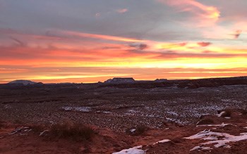 Sunrise over winter desert landscape