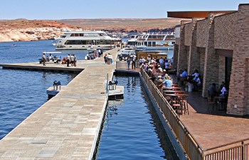 Dock walkway next to busy restaurant patio