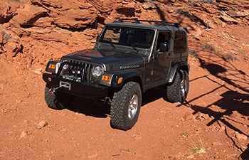 Vehicle on sandstone.