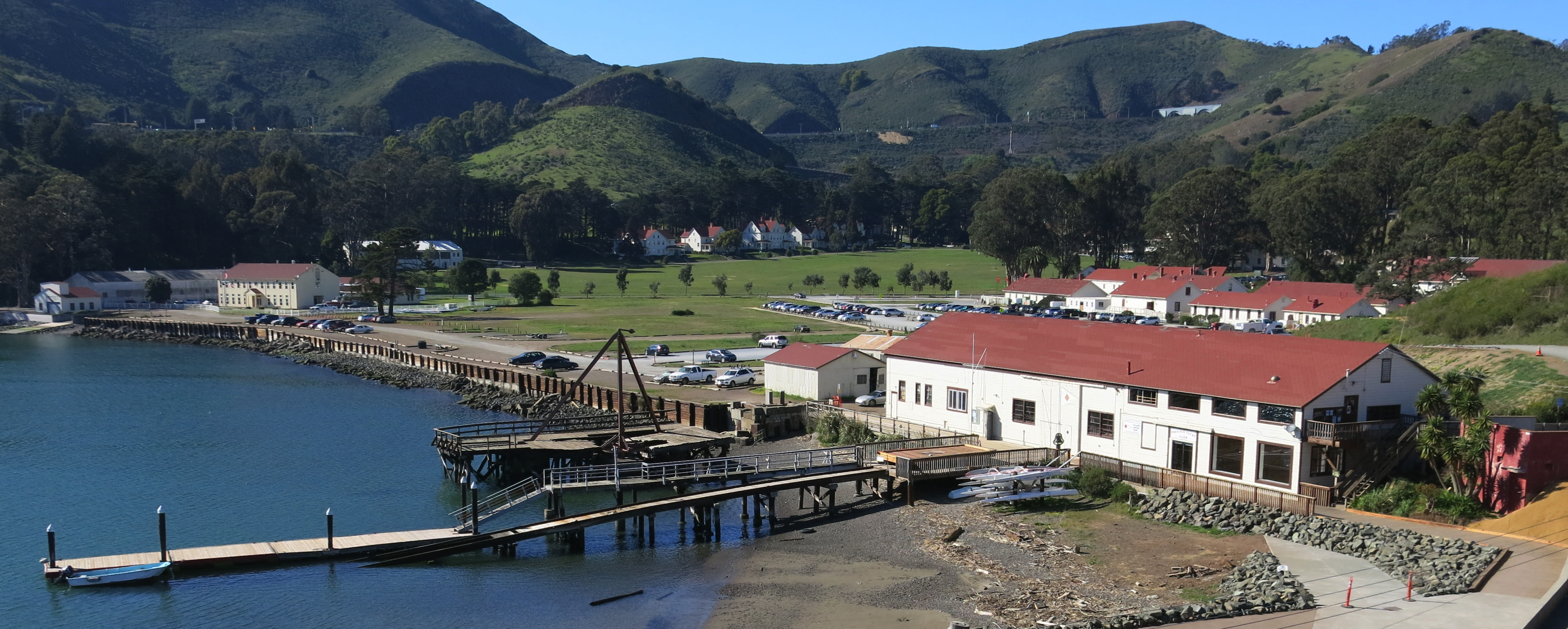 Fort Baker water front with buildings, large lawn and headlands in the background Fort Baker water front with buildings, large lawn and headlands in the background
