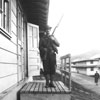 soldier with bayonette in front of barracks