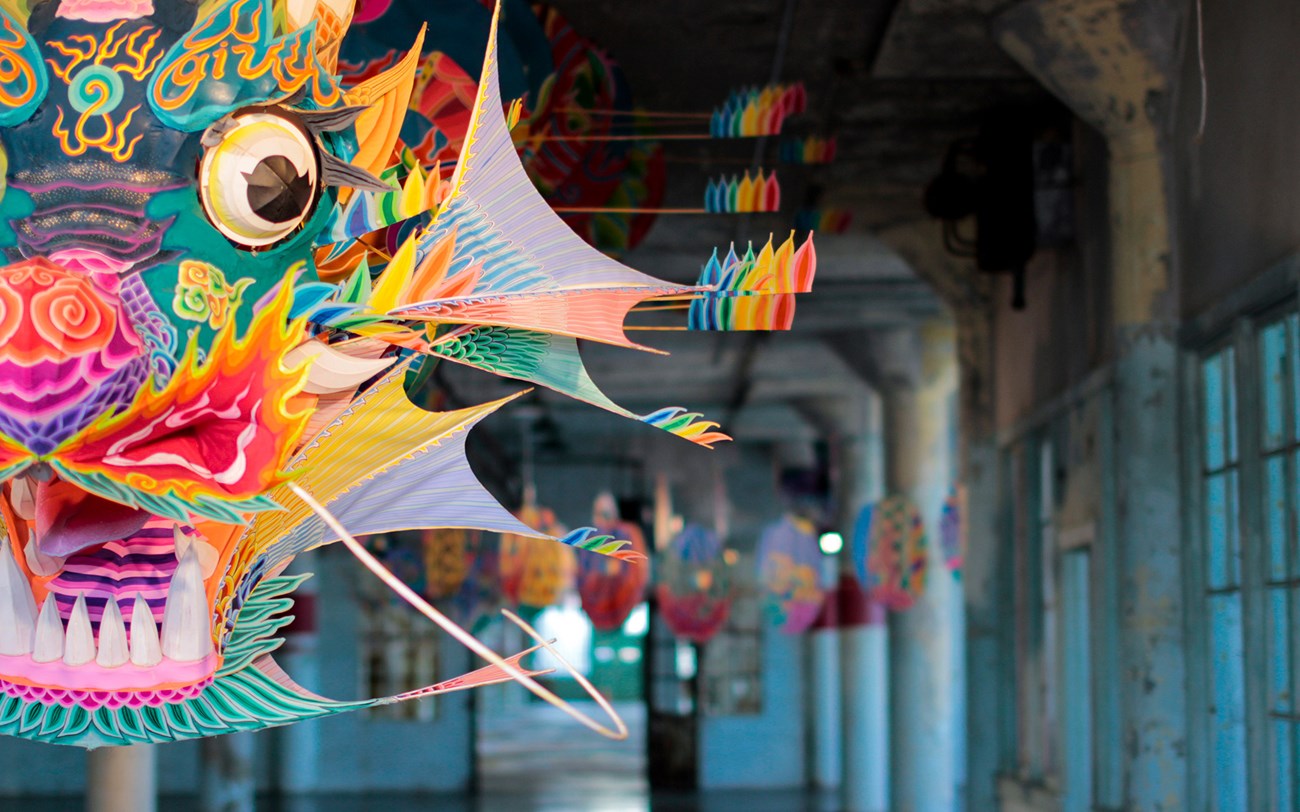 Colorful paper dragon hangs from Alcatraz ceiling