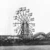 historic ferris wheel and small rollercoaster