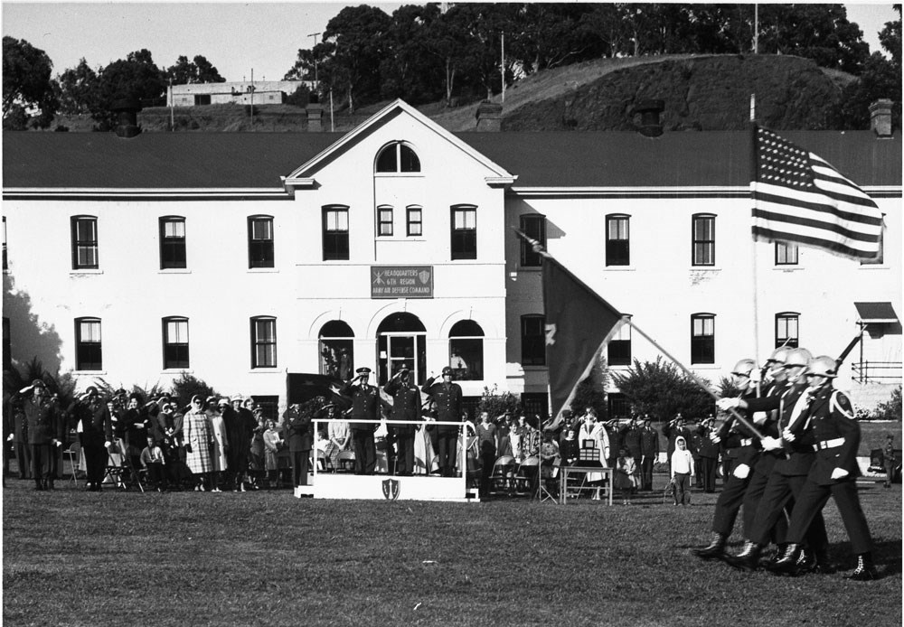 soldiers in formation conducting exercises in front of audience