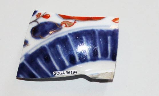 small piece of brightly colored pottery