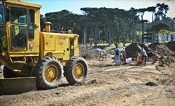 yellow truck at dig site