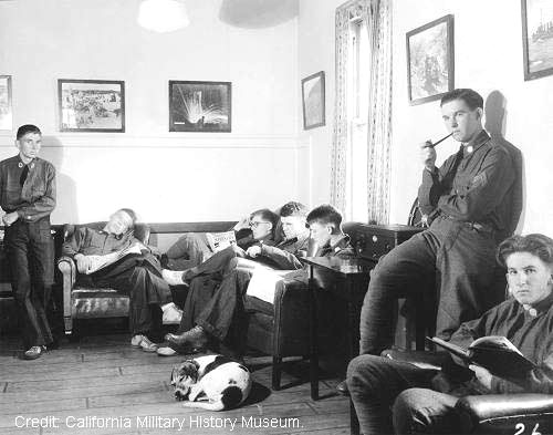 Photo of Fort Scott soldiers at ease in their day room