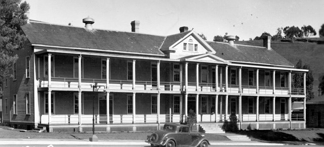 long wooden building with front porch