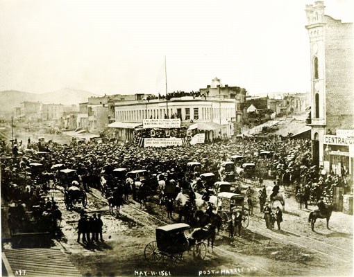 historic photo of Union demonstration with crowd of people and horse-drawn carriages