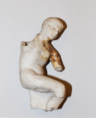 small sculpture piece of person