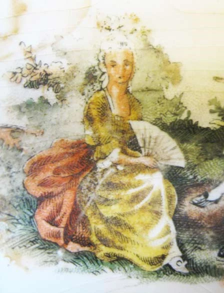 colorful detail of pastoral scene on ceramic