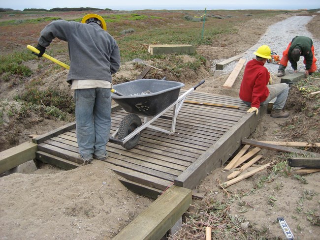 Student Conservation Corps members working on Sunset Loop Trail at Fort Funston.