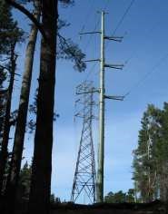 New steel PG&E tranmission towers in front of older lattice structure. New steel PG&E tranmission towers in front of older lattice structure.