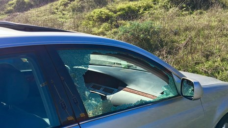 A vehicle with a broken window