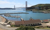 A clear day at Fort Baker marina and waterfront on the bay, Golden Gate Bridge in view.