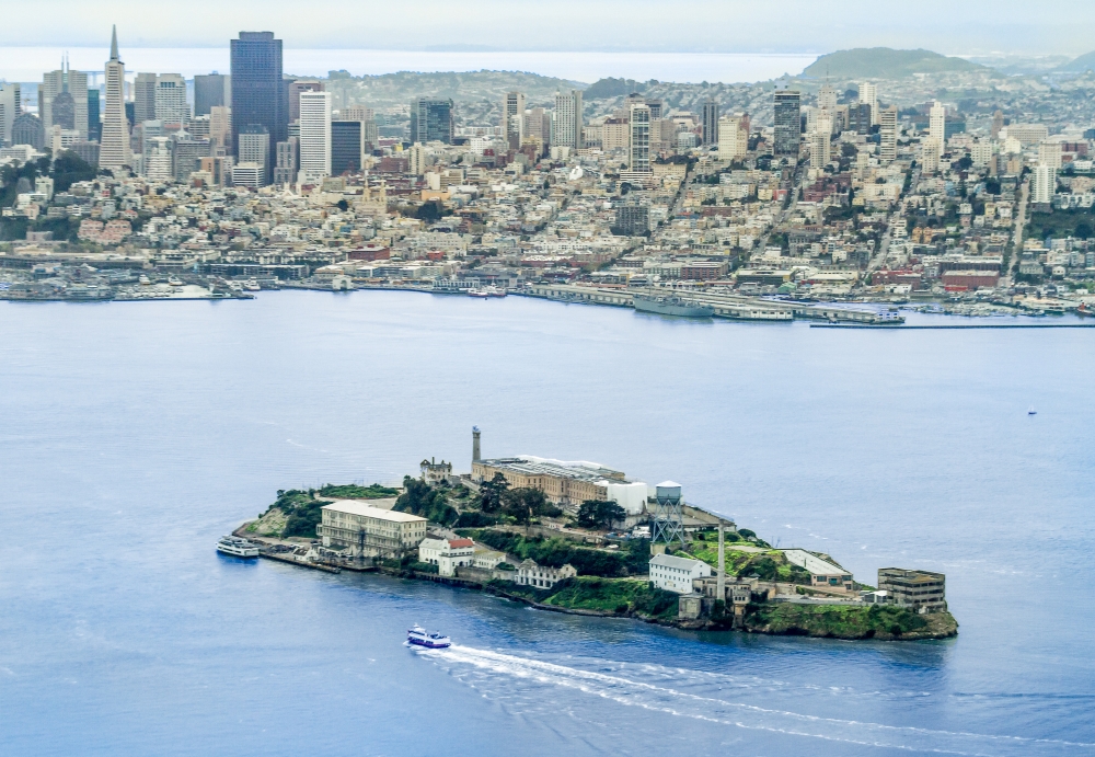 Alcatraz Island and San Francisco A distant view of Alcatraz Island with the cityscape of San Francisco in the background