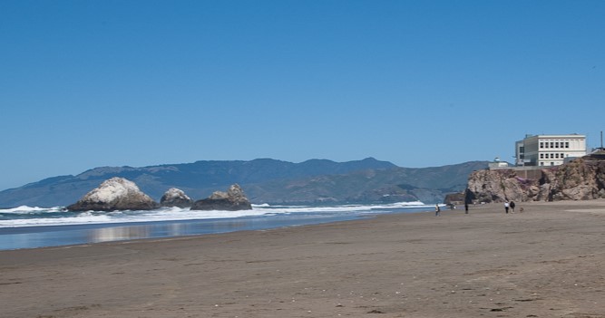 The northern end of Ocean Beach with the former Cliff House building in the background The northern end of Ocean Beach with the former Cliff House building in the background