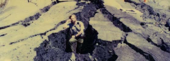 Ranger standing in fissure caused by winter storms