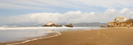 view of Cliff House from Ocean Beach with ocean and clouds in background view of Cliff House from Ocean Beach with ocean and clouds in background
