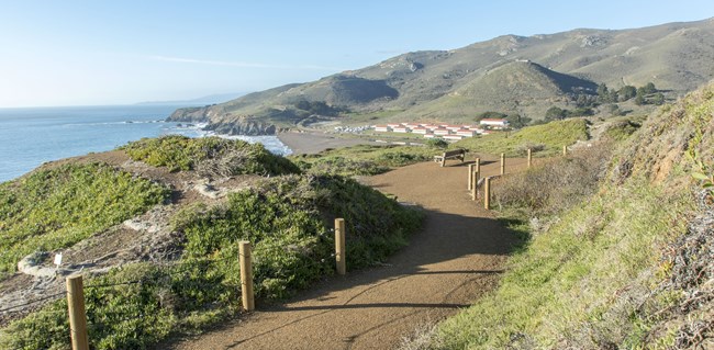 Trail leading to bench overlooking Rodeo Beach and Fort Cronkhite