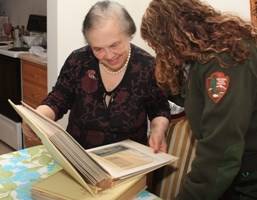 Mrs. Wanderlingh discusses her memories of Governors Island with a National Park Ranger.