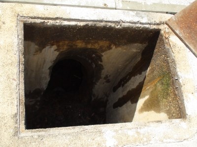 The air-shaft entrance to the intact underground chamber.