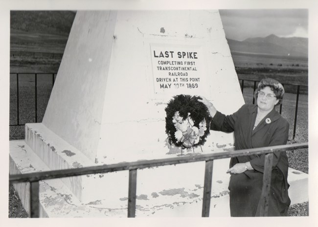 Bernice Gibbs infront of a monument at Golden Spike