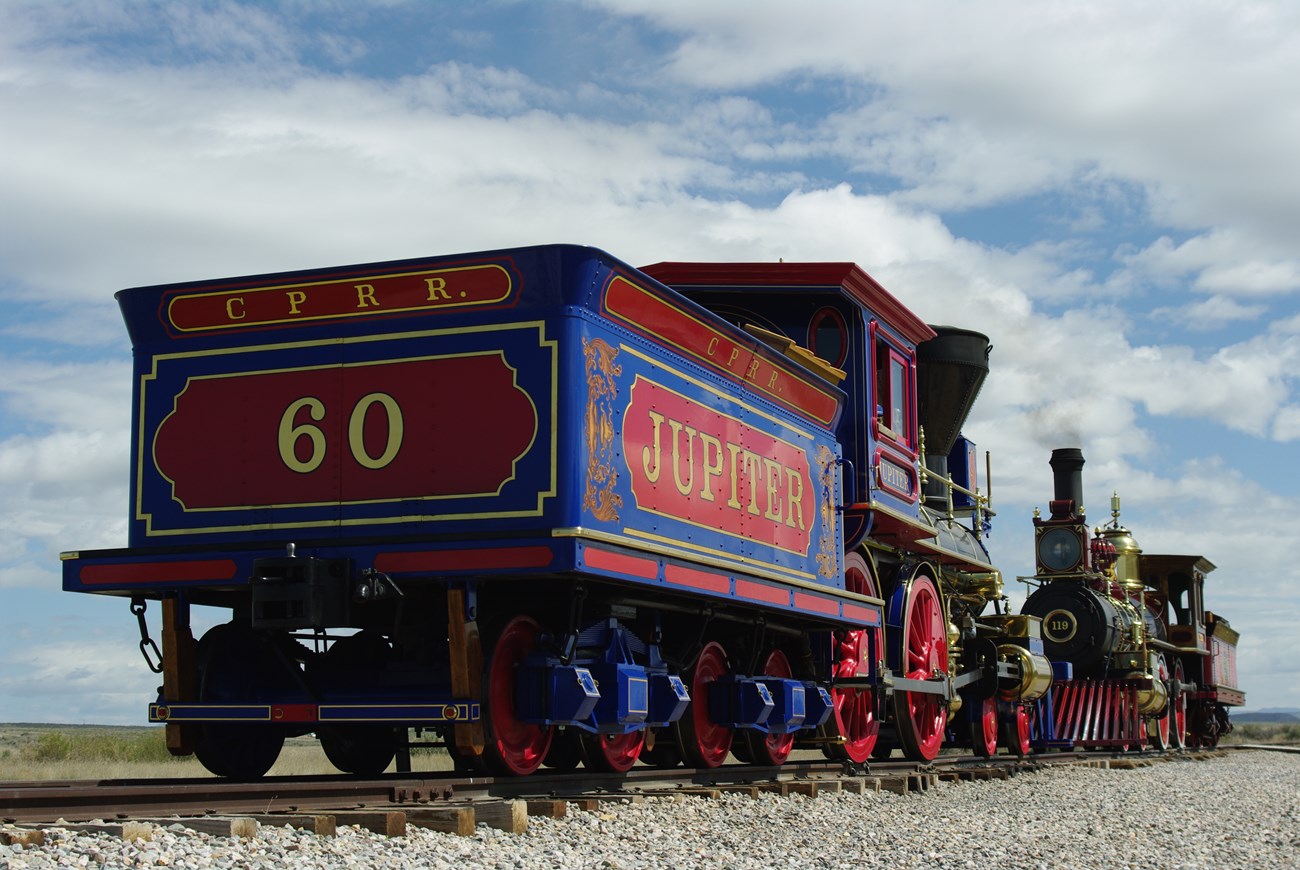 The Jupiter and 119 steam at the last spike site.