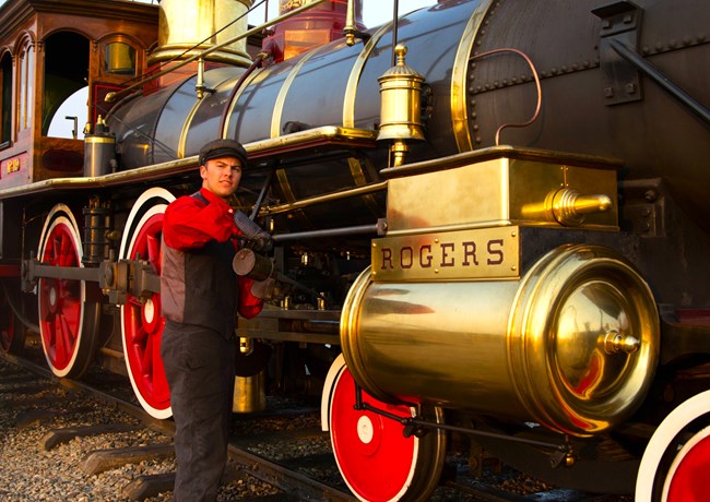 Locomotive Engineer Jace Oiling Train