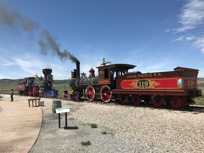 Locomotives at last spike site with a ranger giving a program.