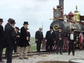 Volunteers re-enacting the Driving of the Last Spike Site.