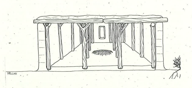 View of the inside of a structure supported by tree trunks and insulated with earth with a roof and an interior fire pit